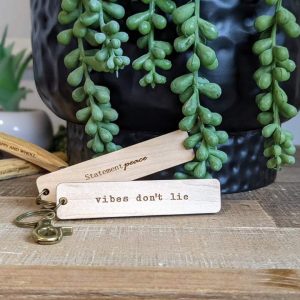 vibes don't lie keychain, wooden keychain by statement peace